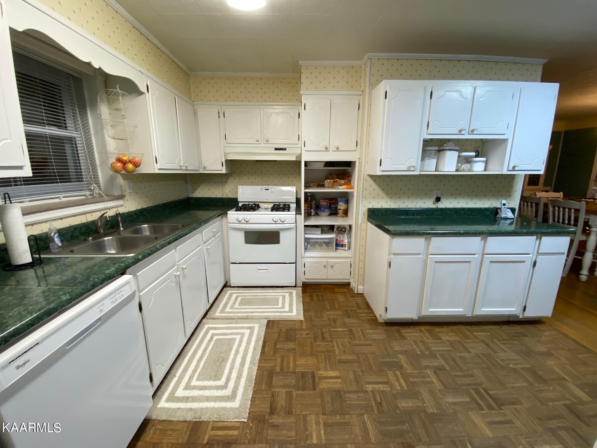 190 Dean Hill Road Oneida, TN 37841 - Photo 11 of 36 a kitchen with stainless steel appliances granite countertop a stove a sink and a microwave