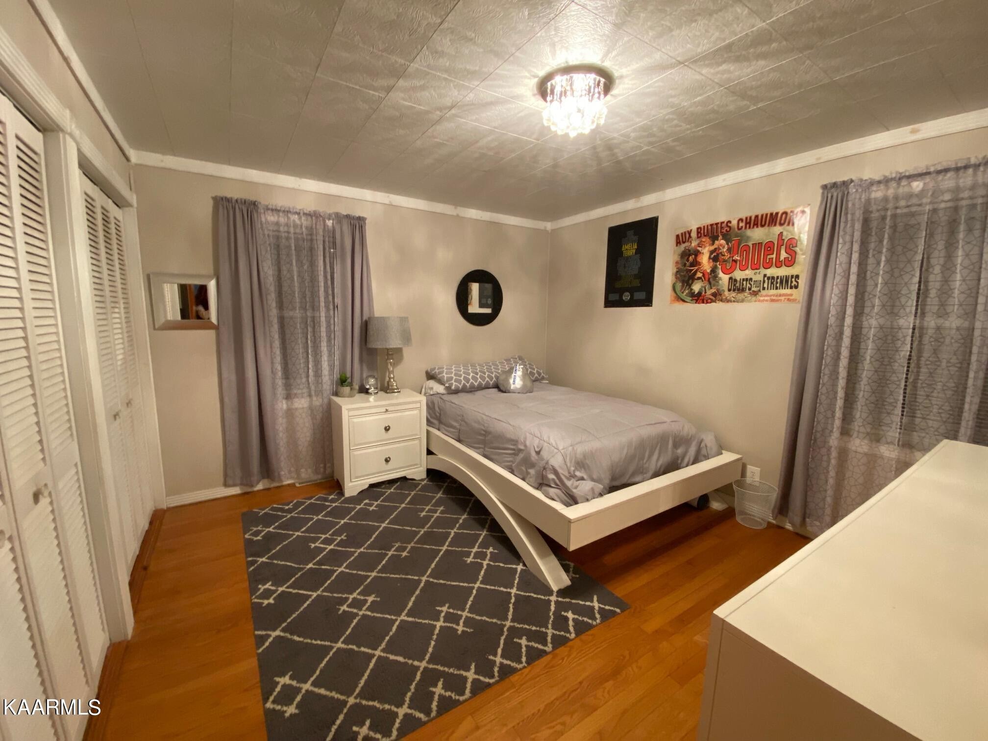 190 Dean Hill Road Oneida, TN 37841 - Photo 13 of 36 a bedroom with a bed and a window
