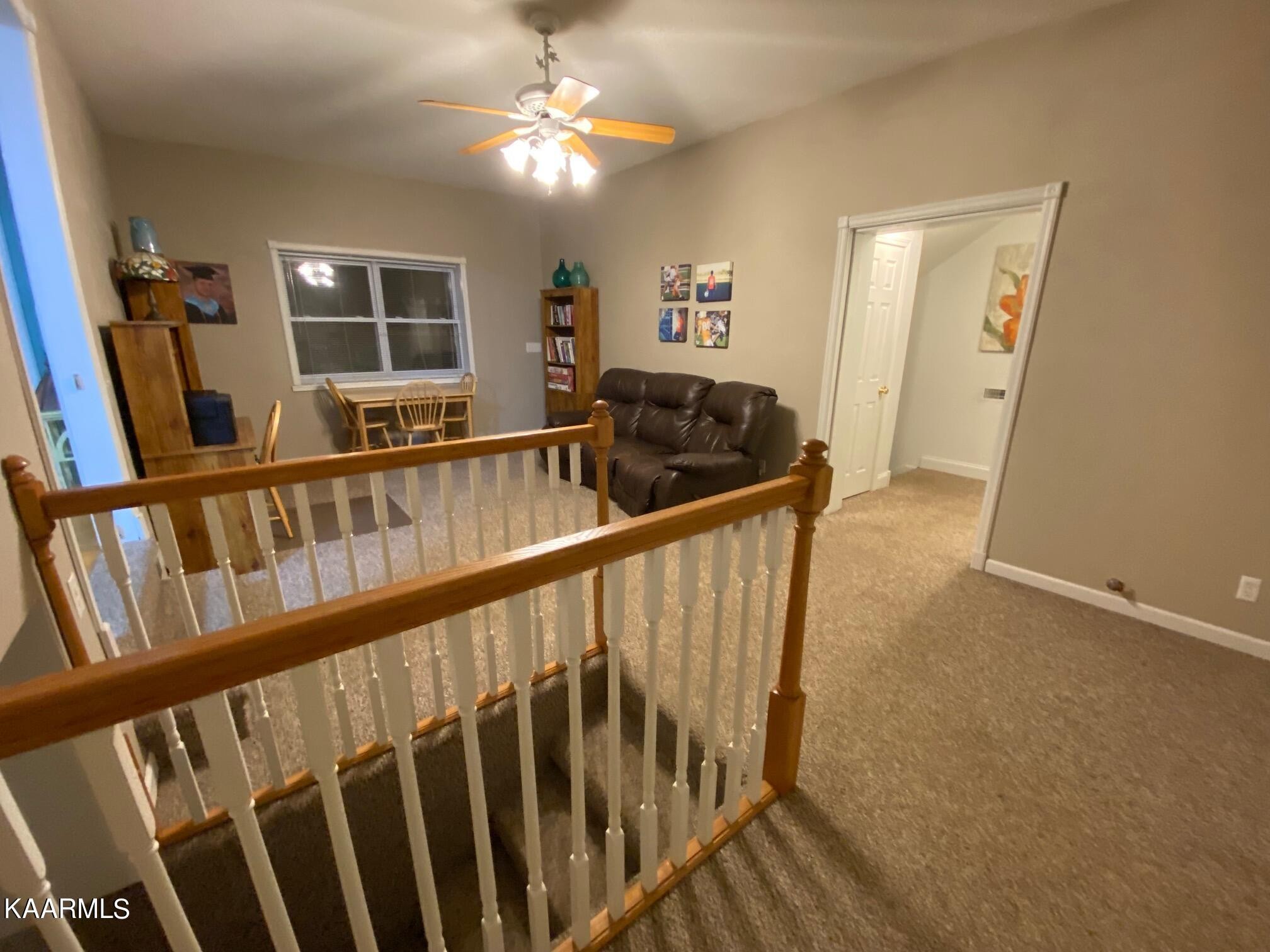 190 Dean Hill Road Oneida, TN 37841 - Photo 17 of 36 a view of a hallway with wooden floor and stairs