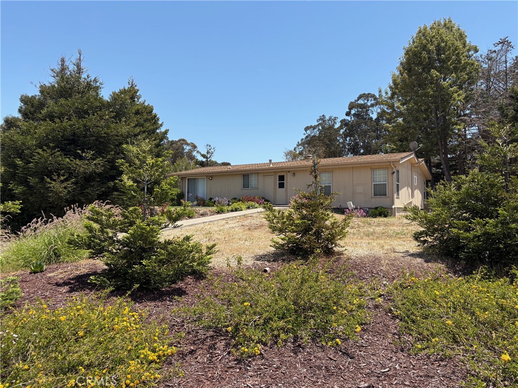 1225 Dawn Road Nipomo, CA 93444 - Photo 5 of 9 a view of a house with a yard and a garden