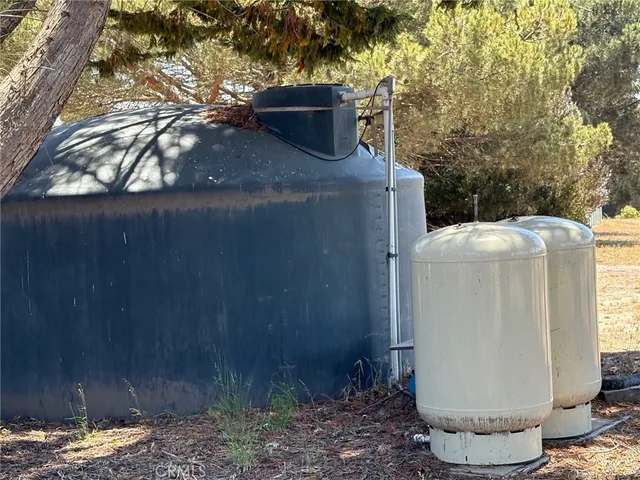 a view of a fountain in the backyard