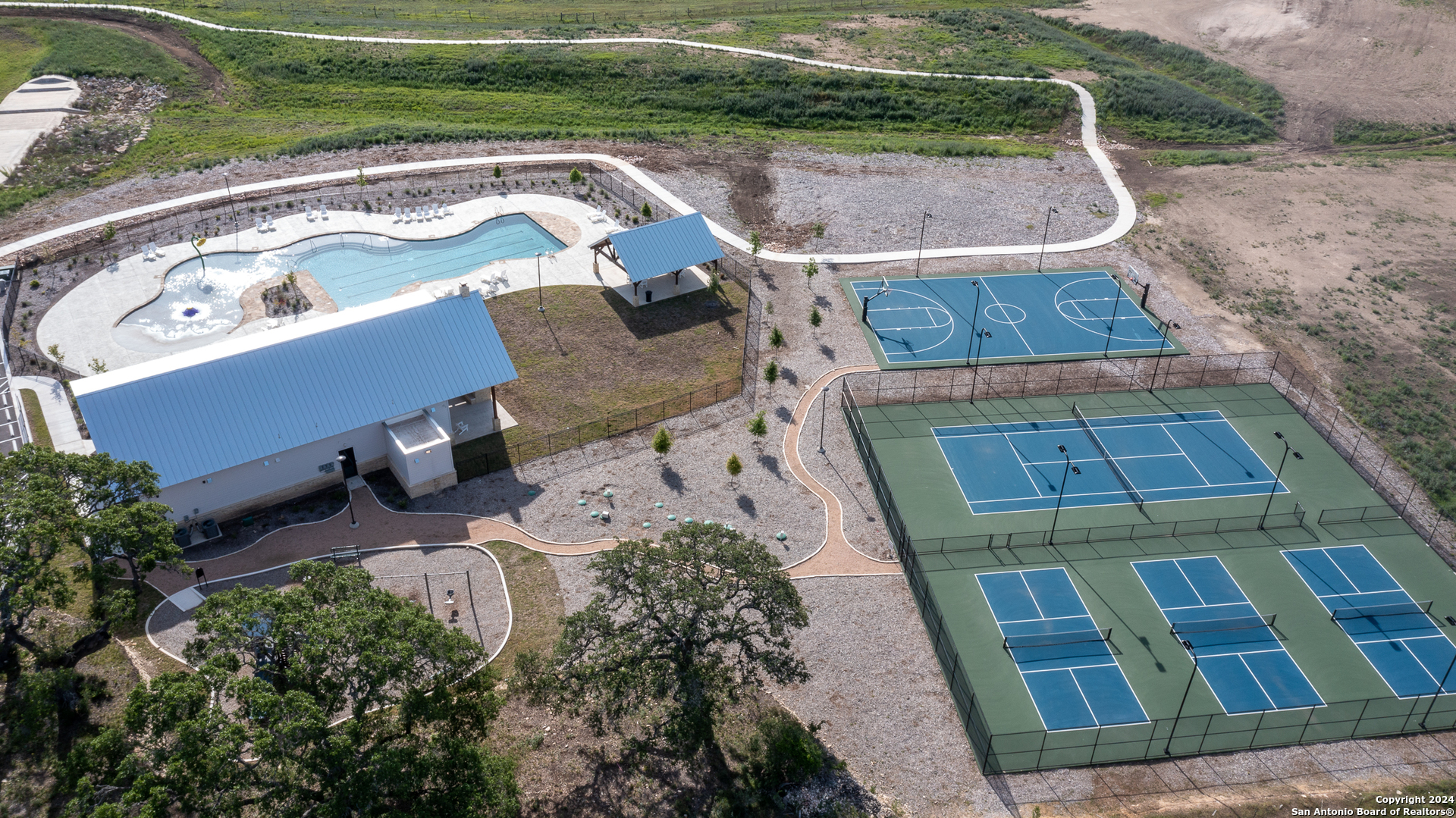739 Maximino Ridge Road Bulverde, TX 78163 - Photo 13 of 36 an aerial view of a house with a yard