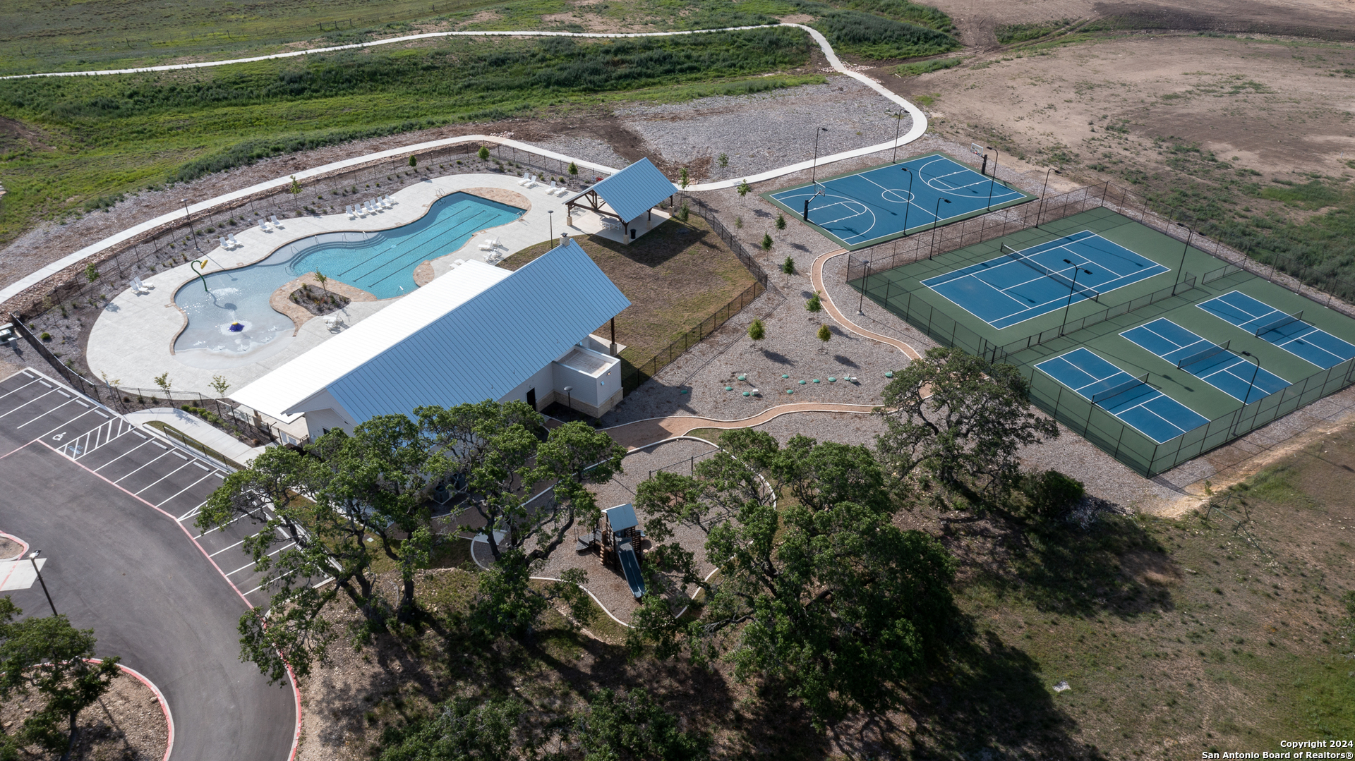 739 Maximino Ridge Road Bulverde, TX 78163 - Photo 14 of 36 an aerial view of a house with a garden