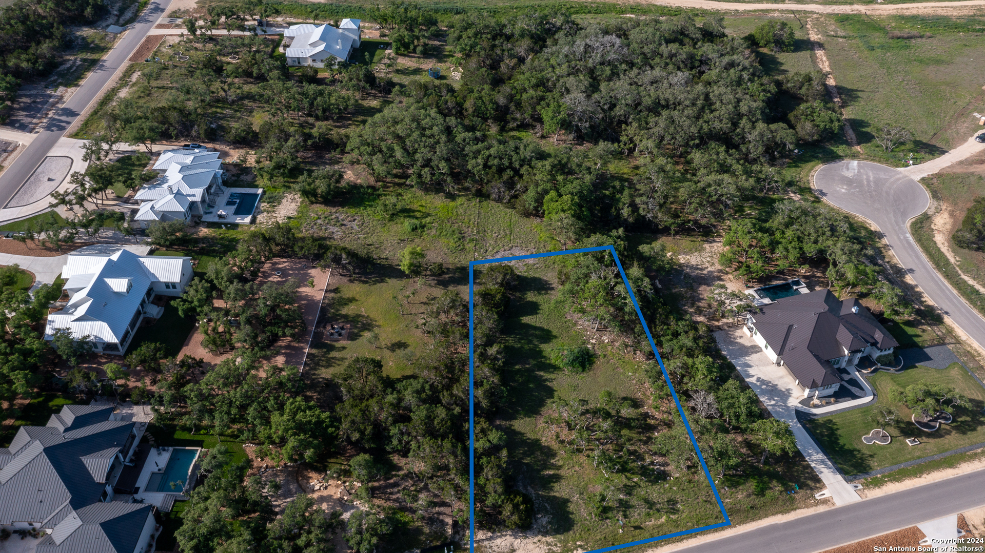 739 Maximino Ridge Road Bulverde, TX 78163 - Photo 7 of 36 an aerial view of multiple house