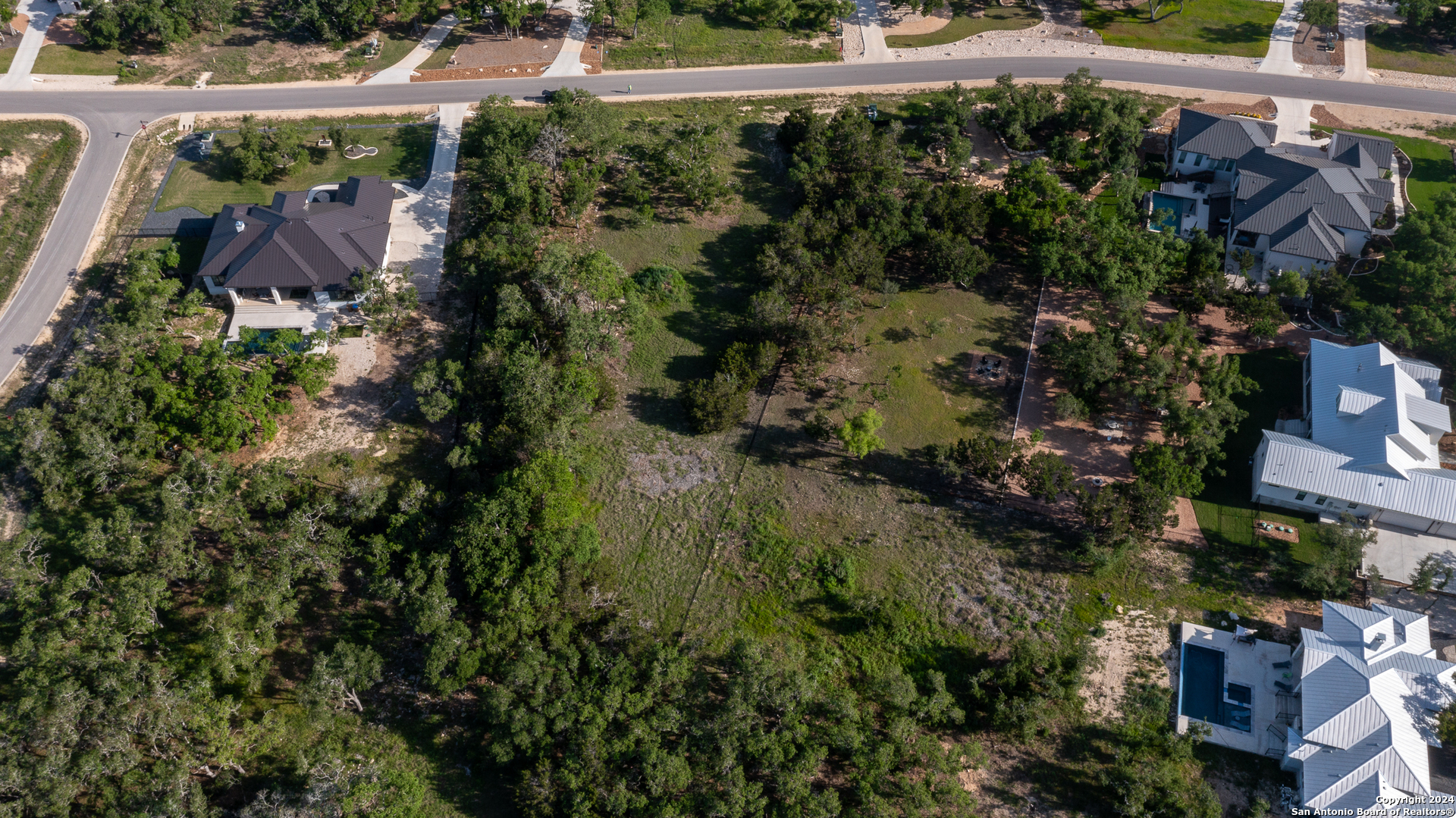 739 Maximino Ridge Road Bulverde, TX 78163 - Photo 8 of 36 an aerial view of multiple house