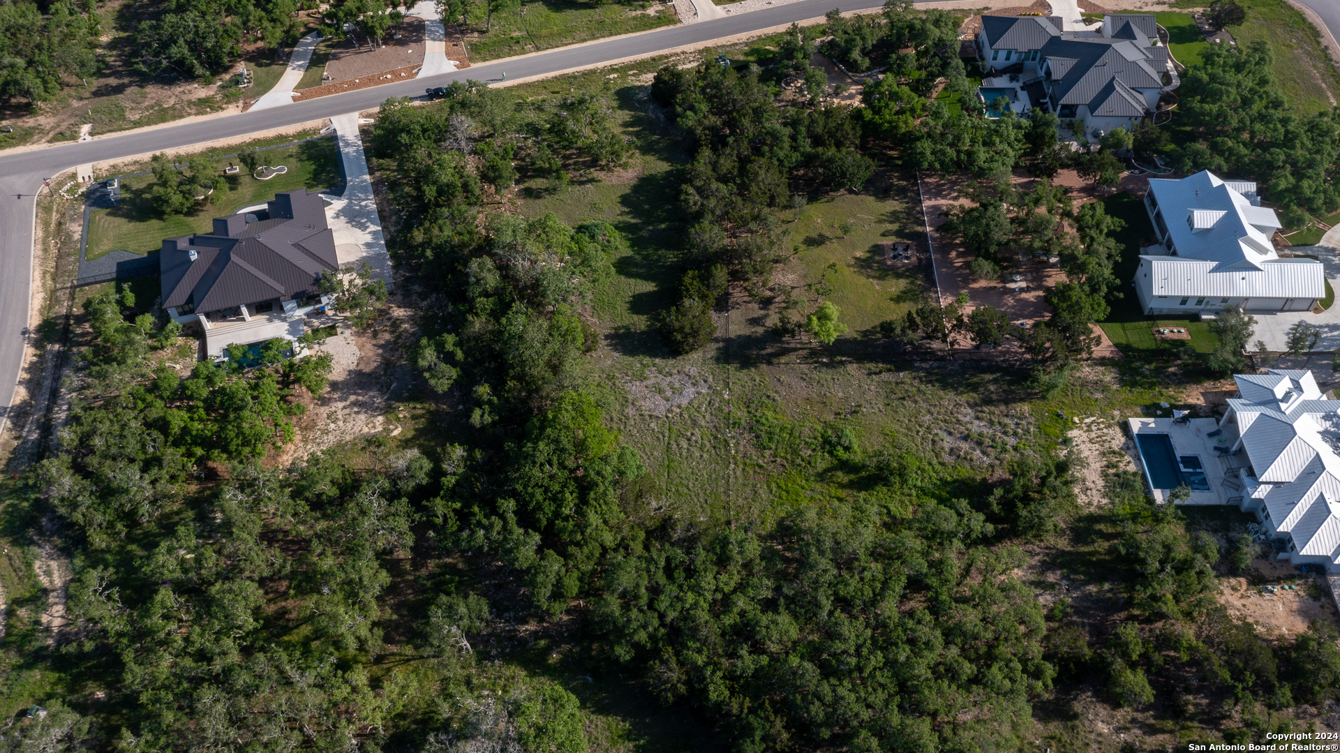 739 Maximino Ridge Road Bulverde, TX 78163 - Photo 9 of 36 an aerial view of house with outdoor space