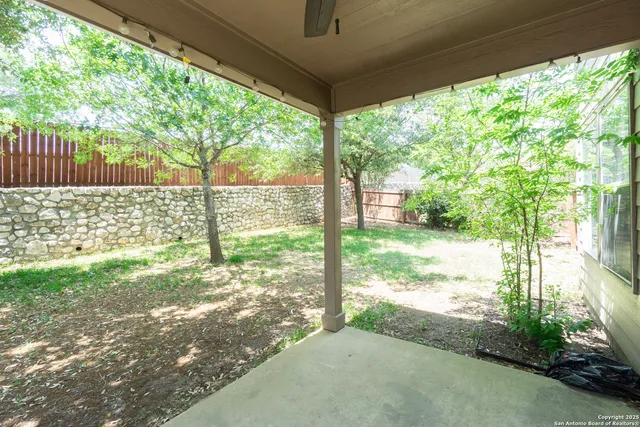 a view of a yard from a porch
