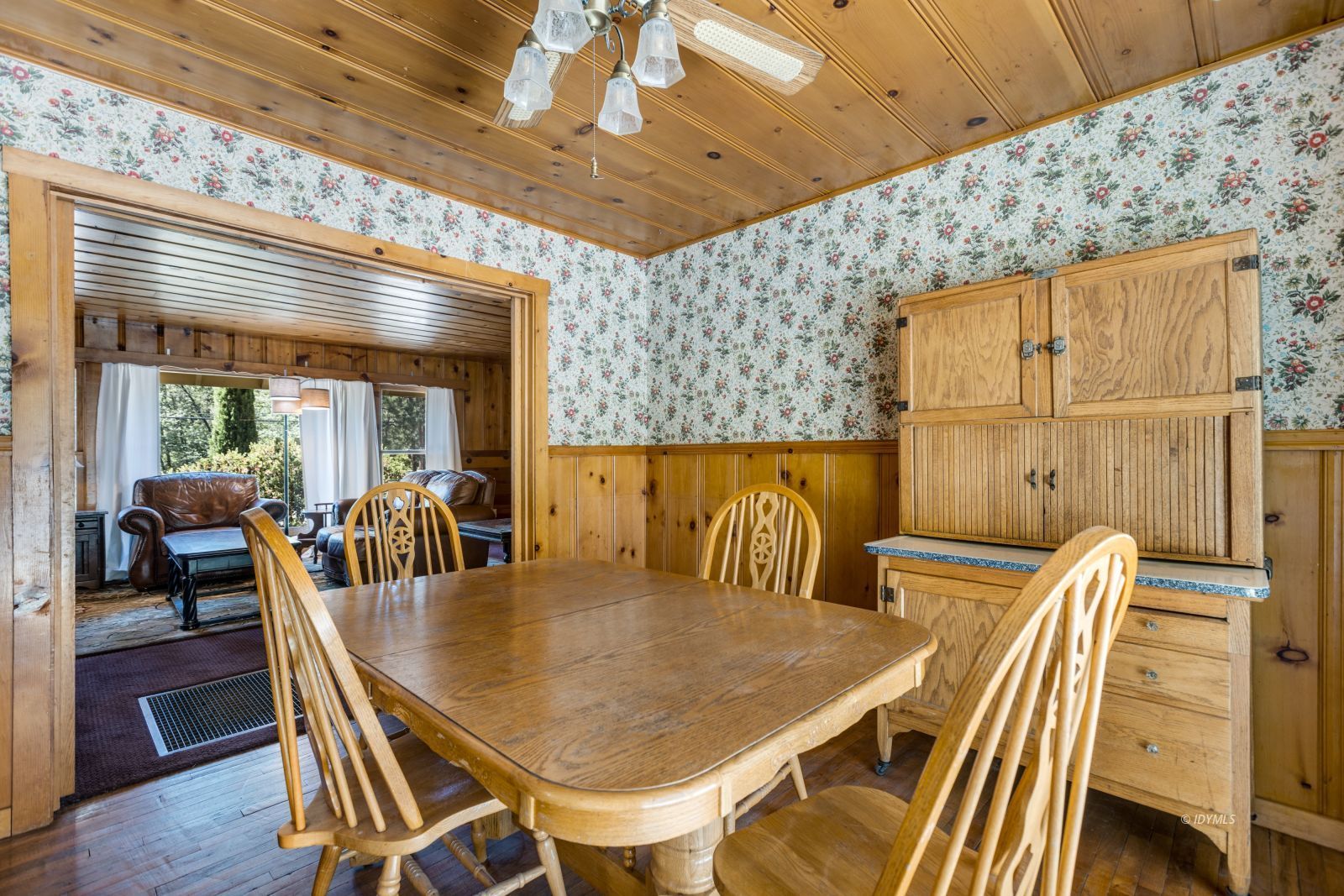 26770 Idyllwild Road Idyllwild, CA 92549 - Photo 11 of 56 a dining room with furniture and wooden floor
