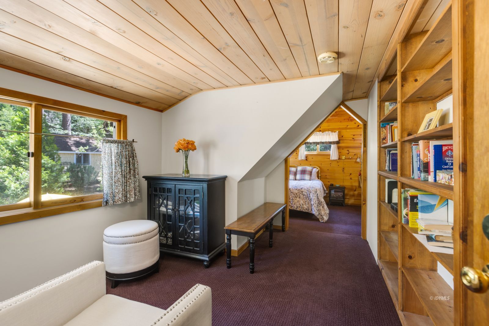26770 Idyllwild Road Idyllwild, CA 92549 - Photo 30 of 56 a living room with furniture and a fireplace