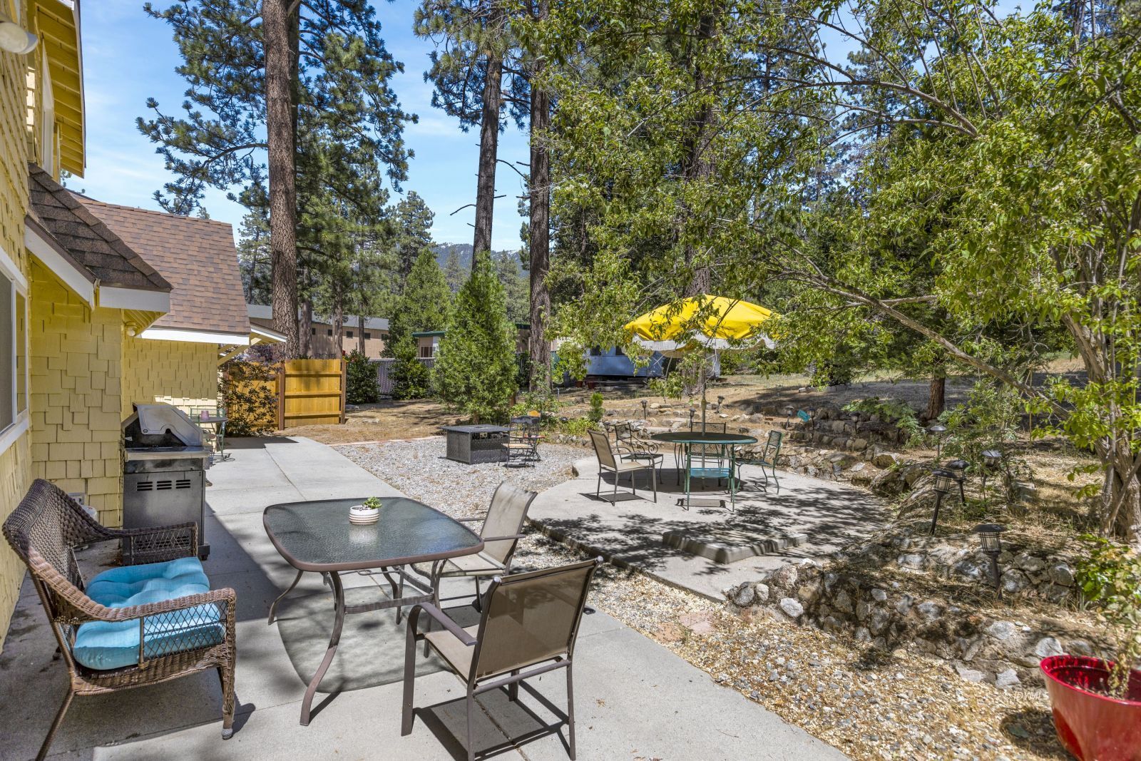26770 Idyllwild Road Idyllwild, CA 92549 - Photo 48 of 56 a swimming pool with outdoor seating and yard