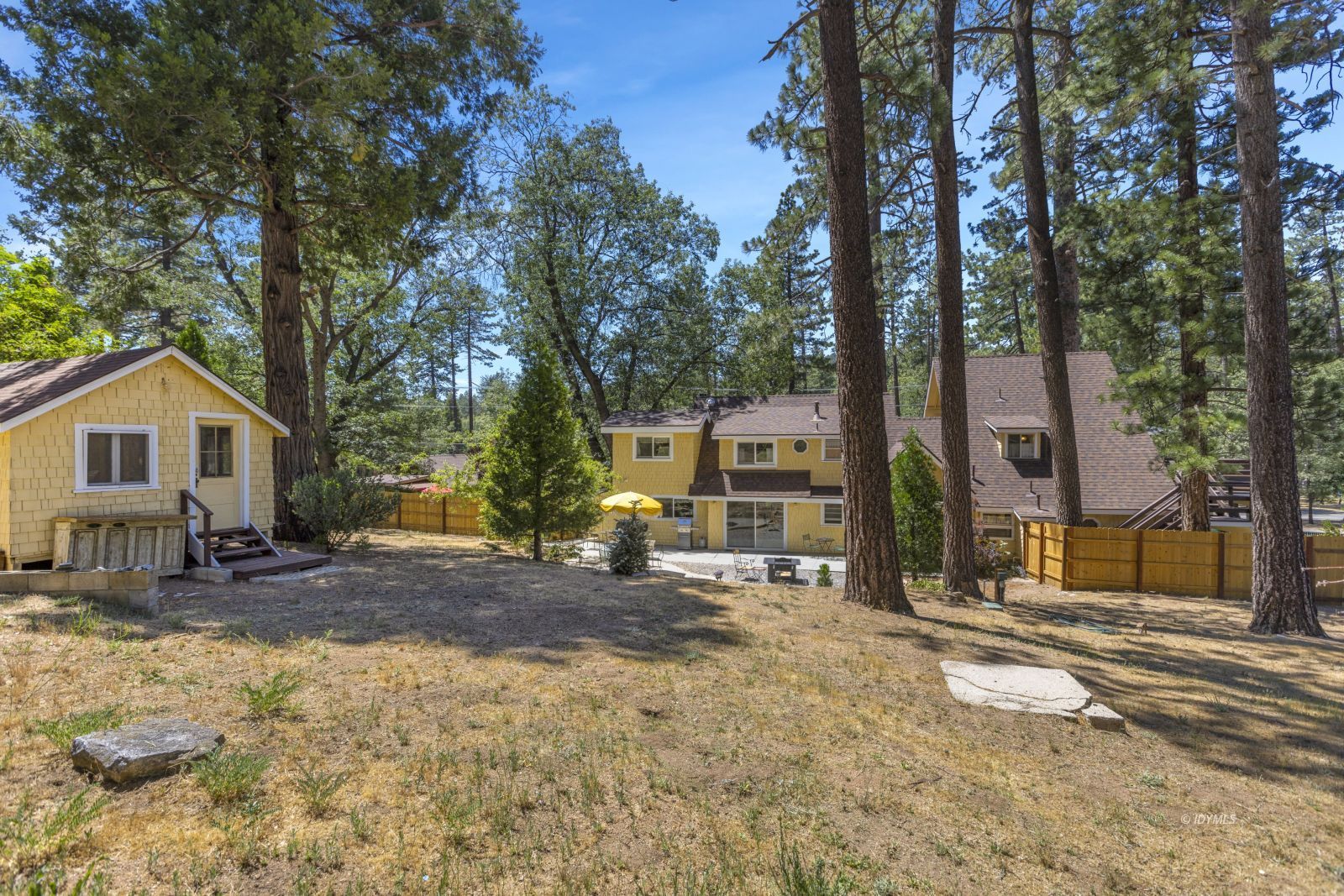 26770 Idyllwild Road Idyllwild, CA 92549 - Photo 55 of 56 a house with trees in the background