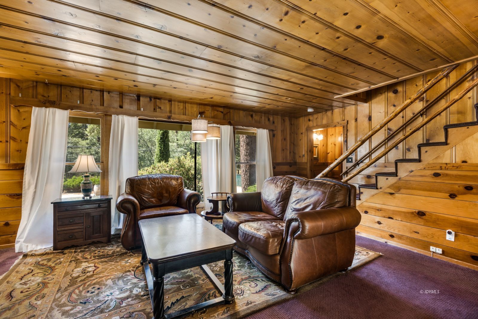 26770 Idyllwild Road Idyllwild, CA 92549 - Photo 6 of 56 a living room with furniture next to a large window