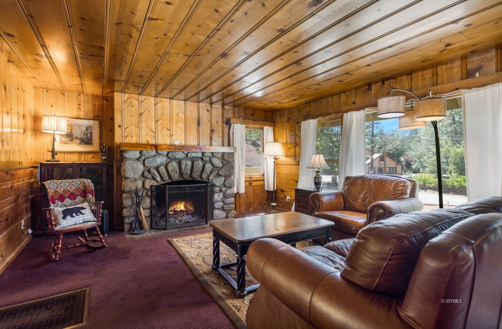 26770 Idyllwild Road Idyllwild, CA 92549 - Photo 8 of 56 a living room with furniture and a fireplace