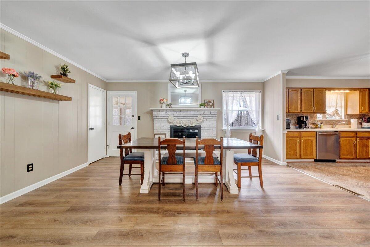 414 Pin Oak Drive Blue Ridge, VA 24064 - Photo 8 of 45 a view of a dining room with furniture window and wooden floor