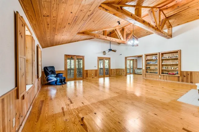 a view of a patio with swimming pool table and chairs