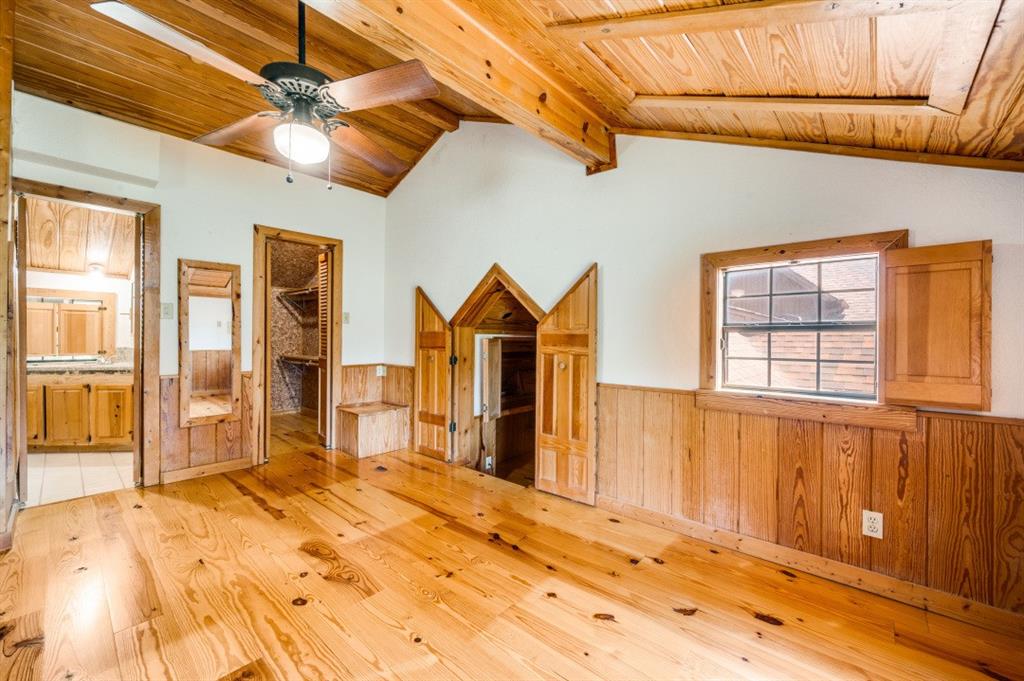 539 North Duncanville Road Cedar Hill, TX 75104 - Photo 30 of 36 a bedroom with a bed and wooden floor