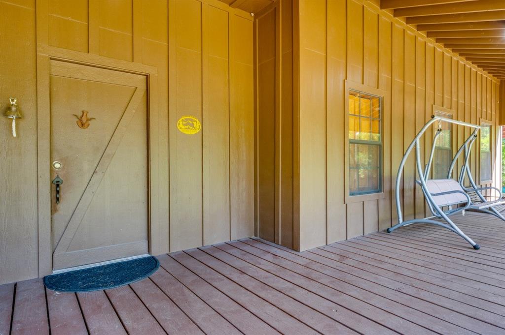 539 North Duncanville Road Cedar Hill, TX 75104 - Photo 3 of 36 a view of a hallway with wooden floor and staircase