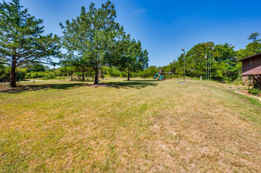 539 North Duncanville Road Cedar Hill, TX 75104 - Photo 35 of 36 a view of a swimming pool with an outdoor space and seating area