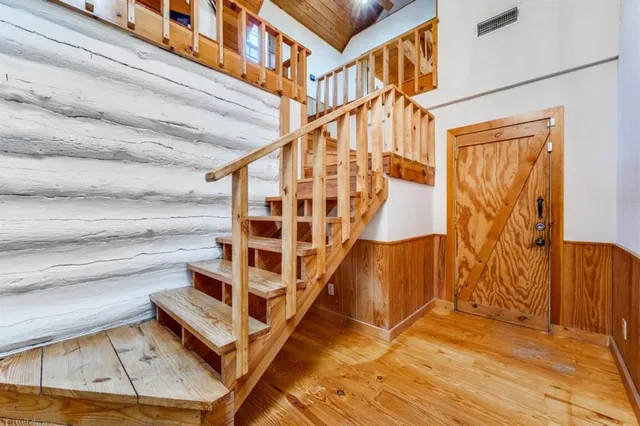 a view of entryway with wooden floor