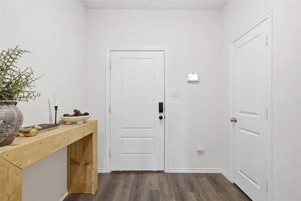 a view of a storage and utility room with closet