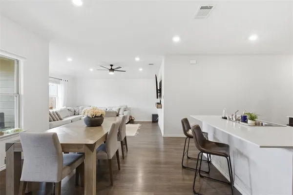 a view of a dining room with furniture