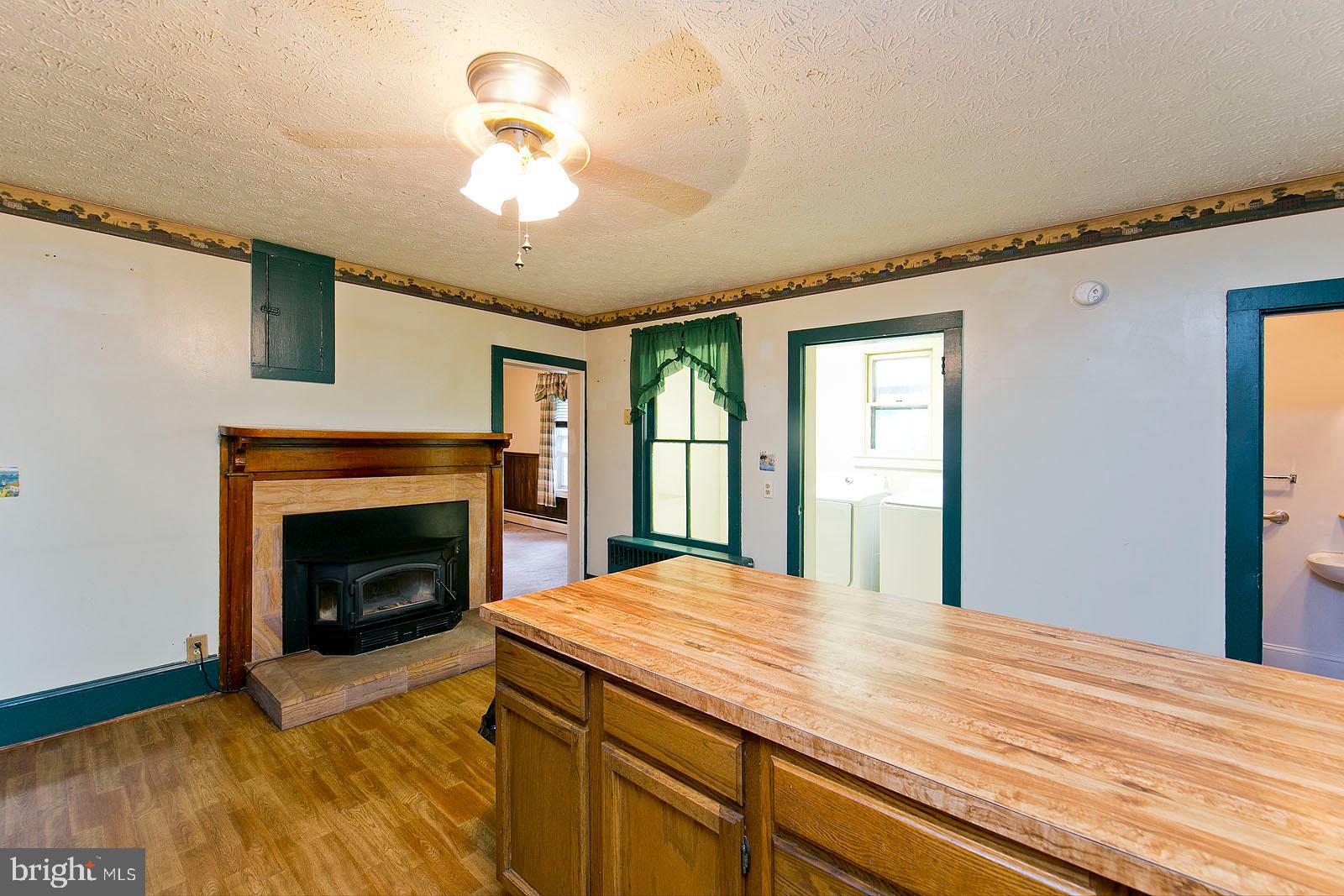 304 Cross Junction Road Cross Junction, VA 22625 - Photo 14 of 61 Wood stove in the kitchen