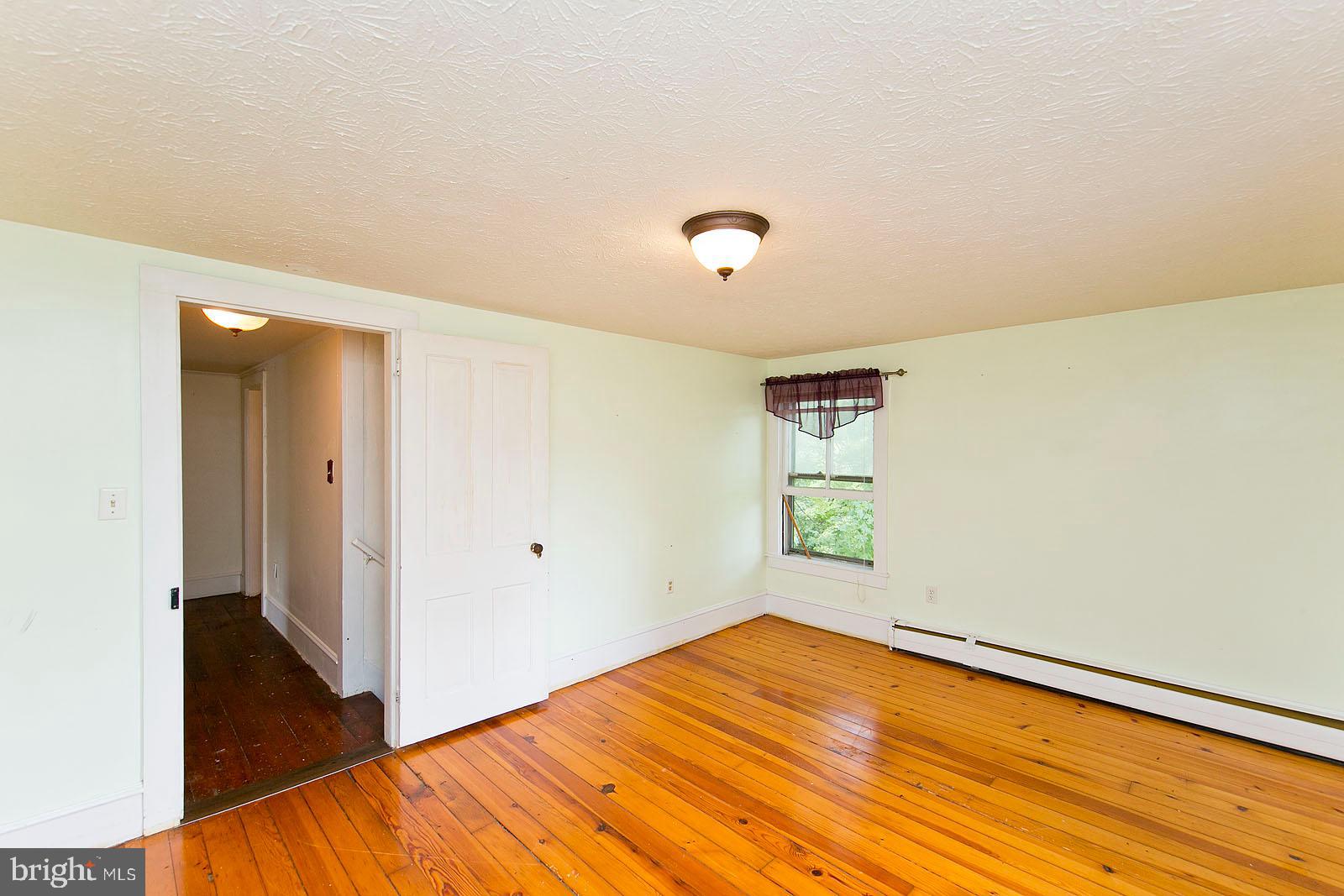 304 Cross Junction Road Cross Junction, VA 22625 - Photo 35 of 61 Great size bedroom with hardwood floors