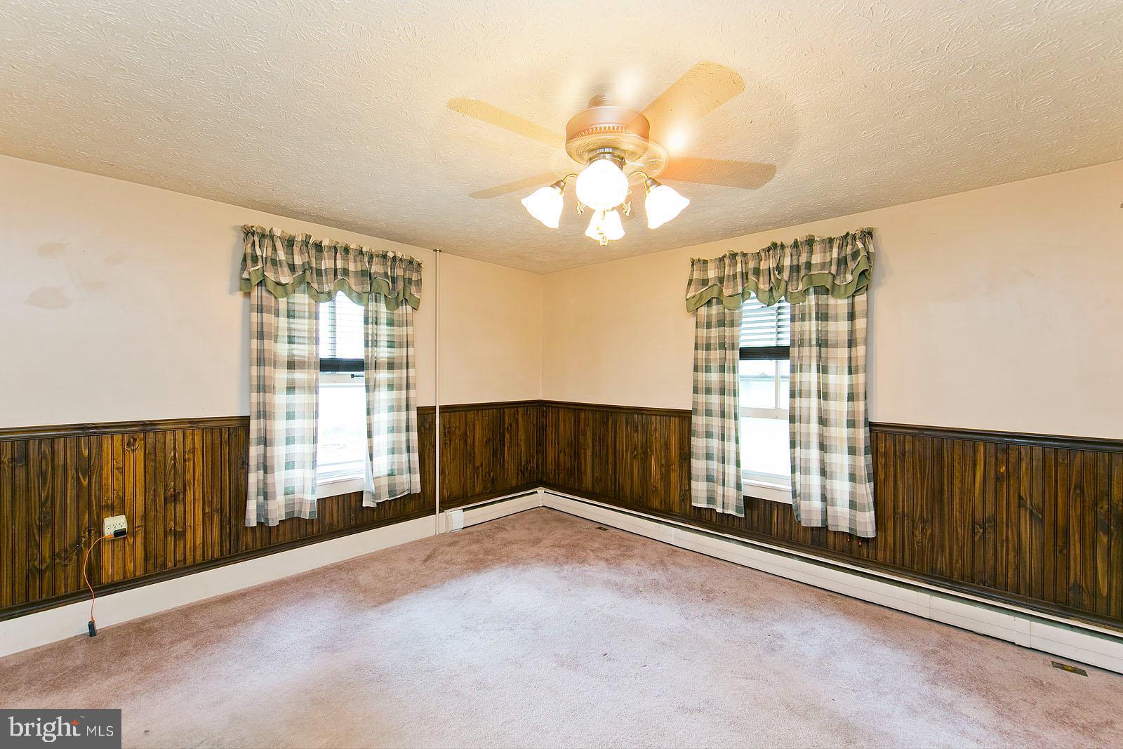 304 Cross Junction Road Cross Junction, VA 22625 - Photo 9 of 61 Nice big windows & ceiling fan w/ overhead lights