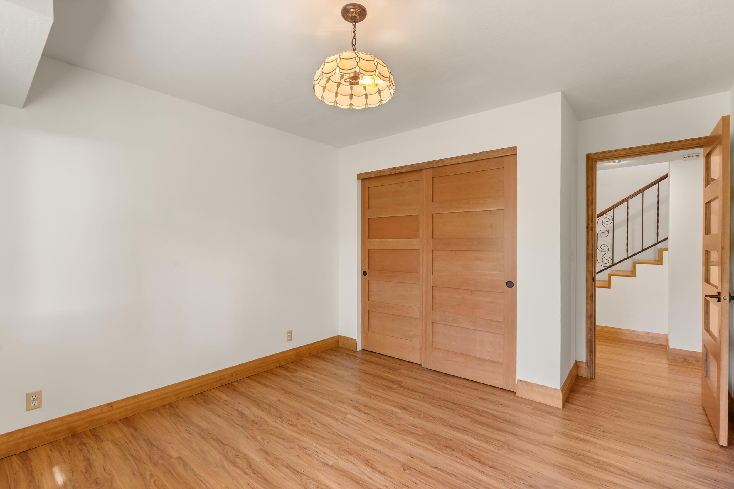3583 Ross Lane Central Point, OR 97502 - Photo 17 of 52 wooden floor in an empty room with a window