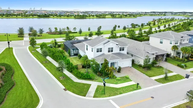 a kitchen with stainless steel appliances granite countertop a sink and stove top oven