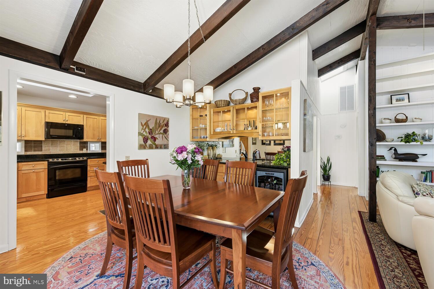 25711 Royal Road Royal Oak, MD 21662 - Photo 15 of 37 a dining room with furniture and wooden floor