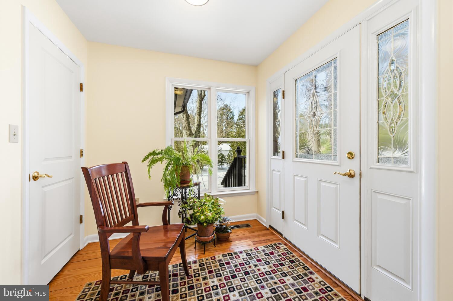25711 Royal Road Royal Oak, MD 21662 - Photo 8 of 37 a view of a hallway with furniture and front door