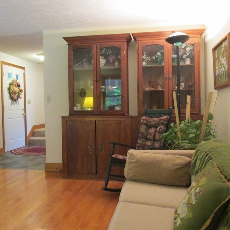 82 Little Turnpike Road Shirley, MA 01464 - Photo 12 of 27 a living room with furniture and a window
