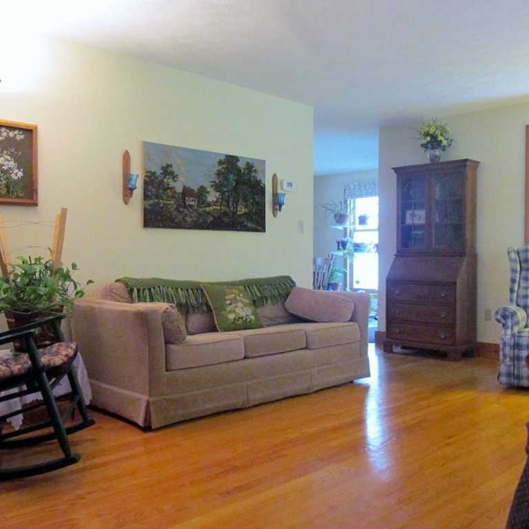 82 Little Turnpike Road Shirley, MA 01464 - Photo 14 of 27 a living room with furniture and a flat screen tv