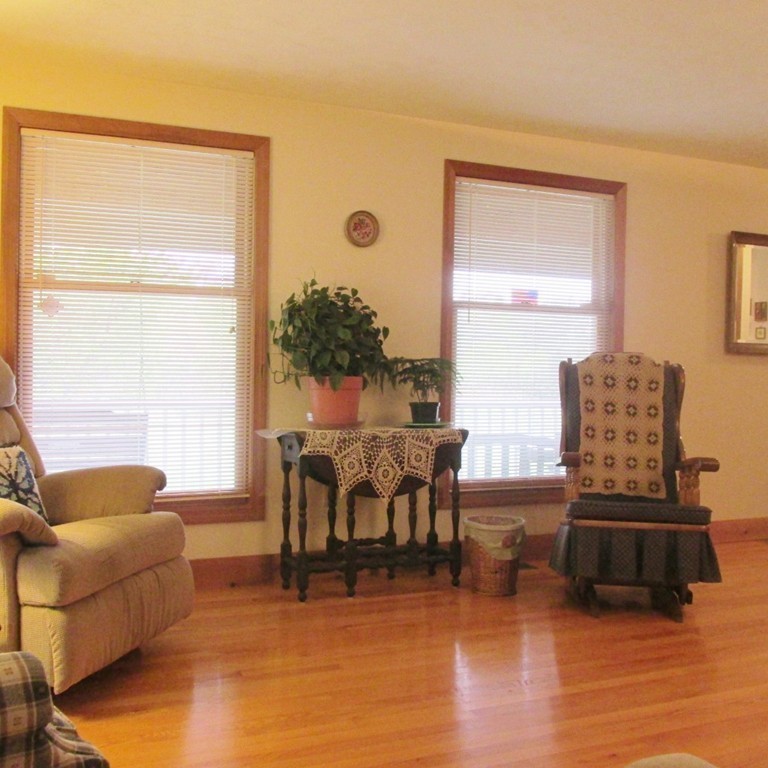 82 Little Turnpike Road Shirley, MA 01464 - Photo 15 of 27 a living room with furniture and wooden floor