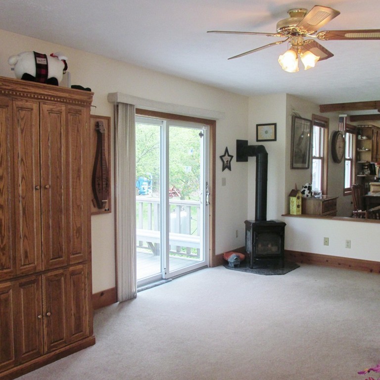 82 Little Turnpike Road Shirley, MA 01464 - Photo 20 of 27 a view of living room with furniture and large window