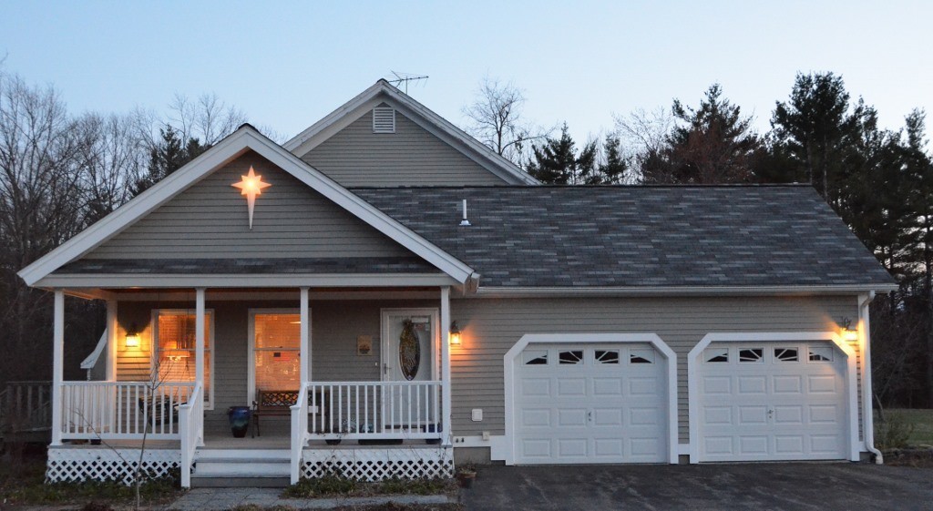 82 Little Turnpike Road Shirley, MA 01464 - Photo 4 of 27 a front view of a house with a yard