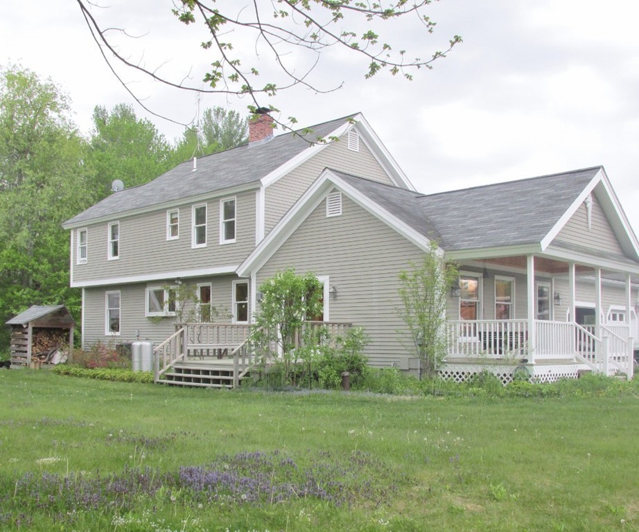 82 Little Turnpike Road Shirley, MA 01464 - Photo 7 of 27 a front view of house with yard and green space