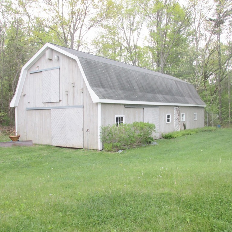 82 Little Turnpike Road Shirley, MA 01464 - Photo 10 of 27 a view of a house with backyard