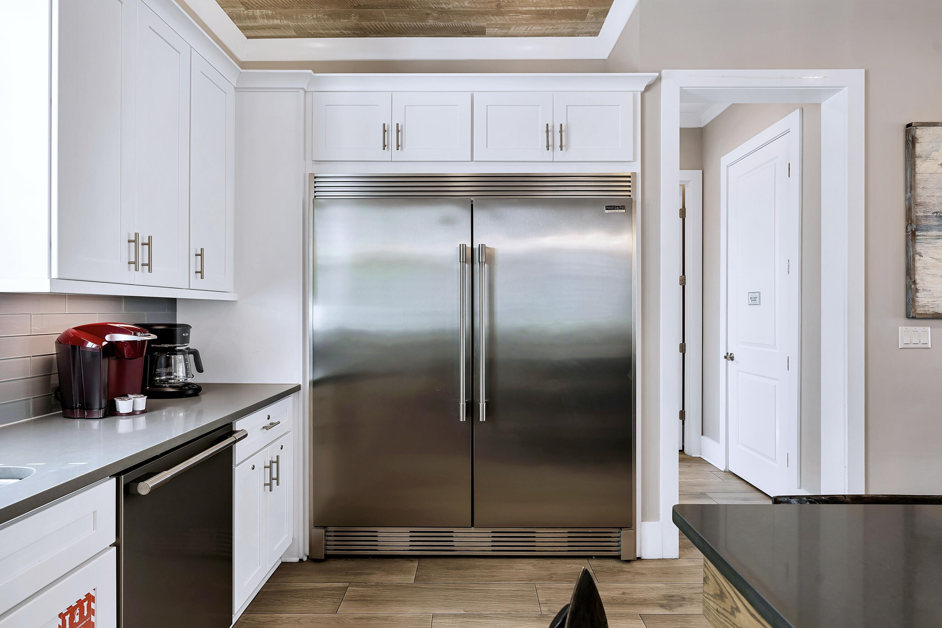 95 Wadleigh Way Miramar Beach, FL 32550 - Photo 12 of 53 a kitchen with stainless steel appliances granite countertop a refrigerator and a sink