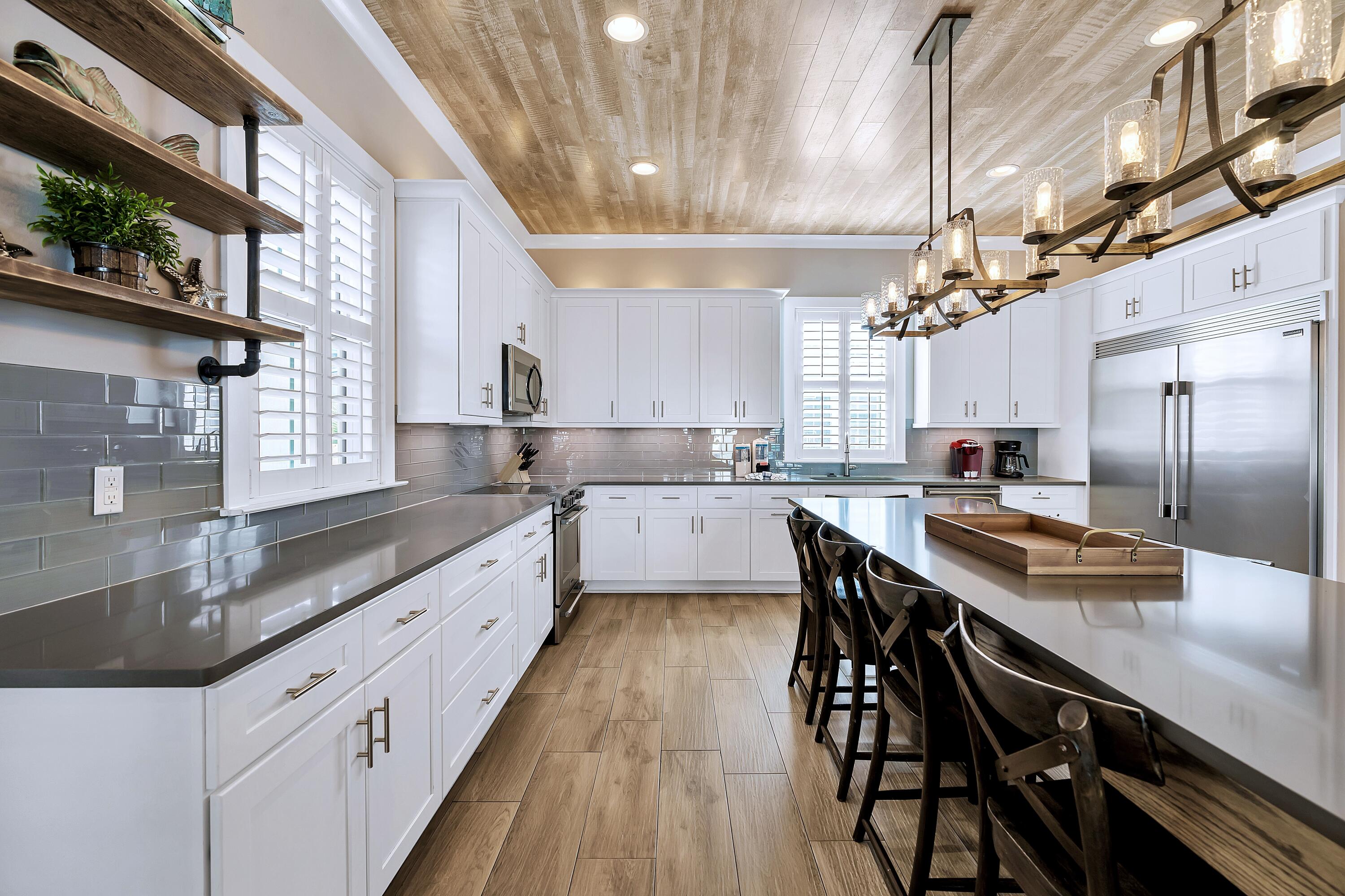 95 Wadleigh Way Miramar Beach, FL 32550 - Photo 15 of 53 a large kitchen with granite countertop lots of counter space and window