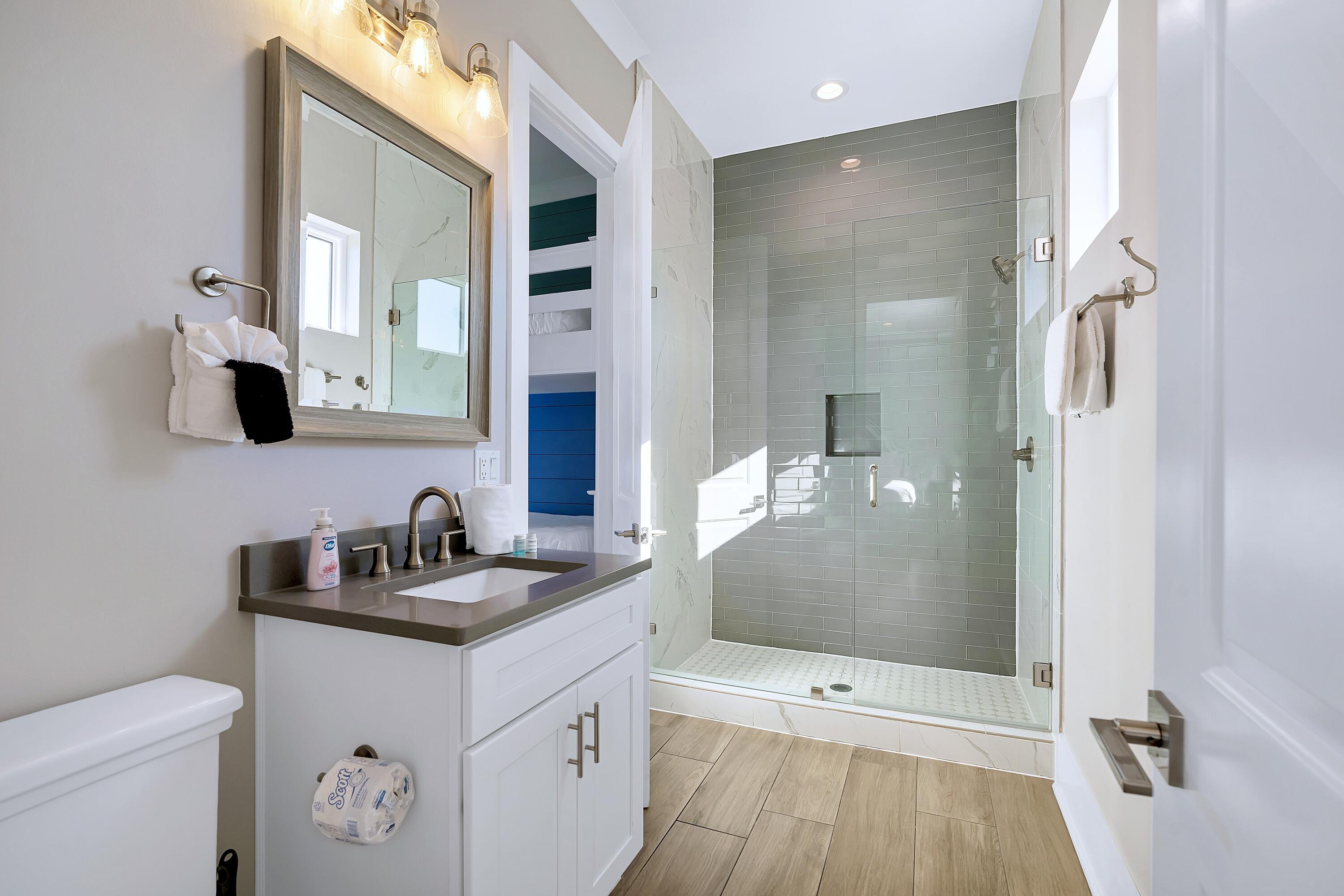 95 Wadleigh Way Miramar Beach, FL 32550 - Photo 26 of 53 a bathroom with a sink a toilet and shower