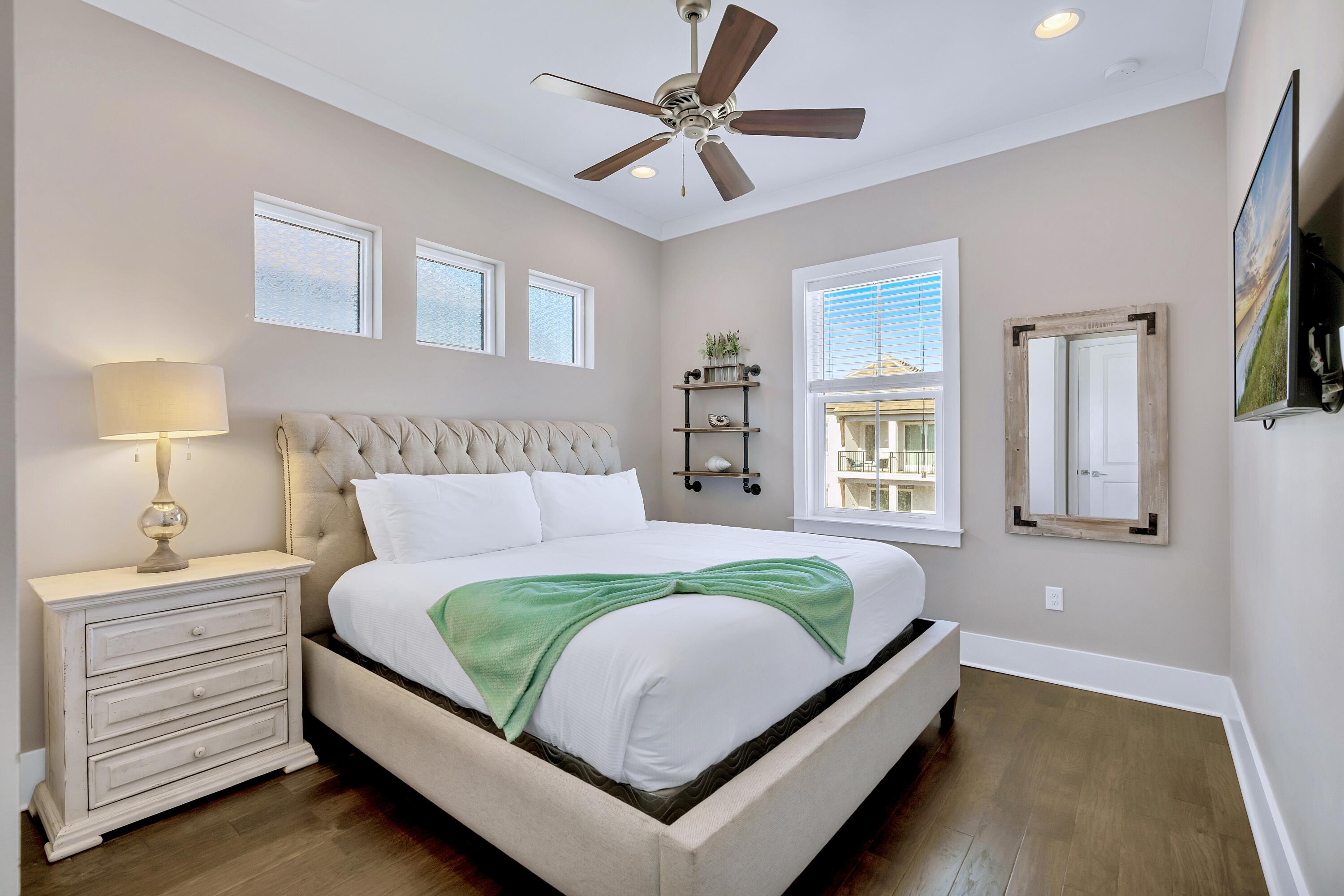 95 Wadleigh Way Miramar Beach, FL 32550 - Photo 40 of 53 a bedroom with a bed lamp closet and a window