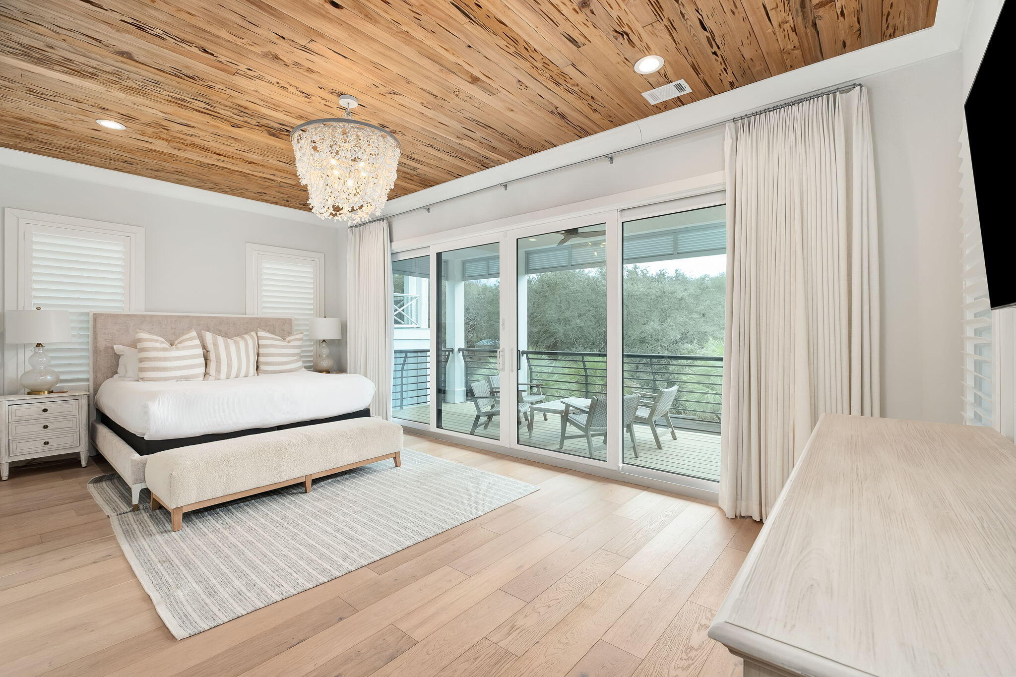133 Bullard Road Santa Rosa Beach, FL 32459 - Photo 12 of 19 a bedroom with a large bed and a large window