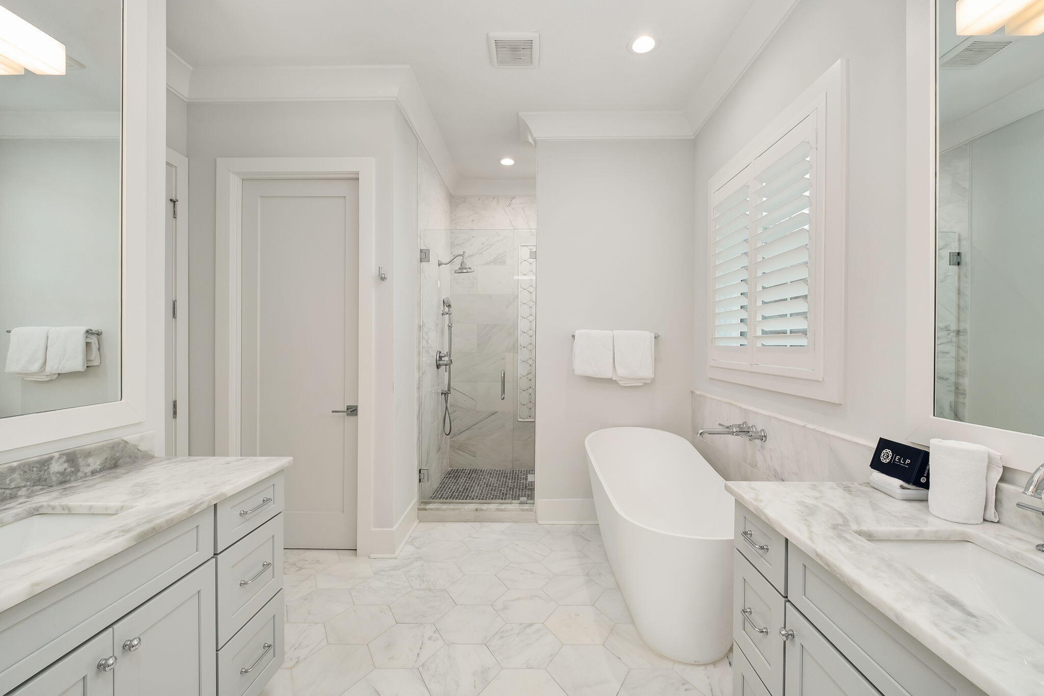 133 Bullard Road Santa Rosa Beach, FL 32459 - Photo 13 of 19 a spacious bathroom with a granite countertop sink a toilet a shower and a mirror