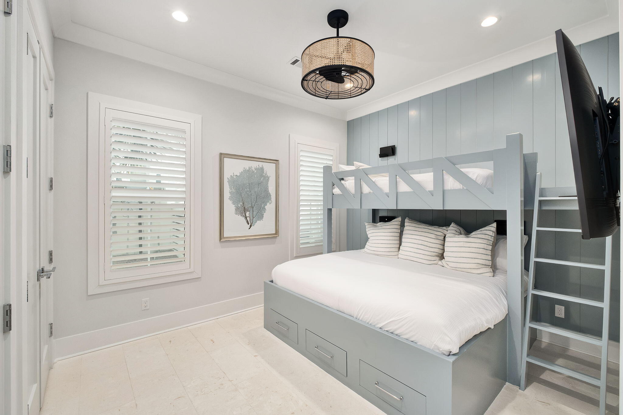 133 Bullard Road Santa Rosa Beach, FL 32459 - Photo 14 of 19 a bedroom with a large bed and a chandelier