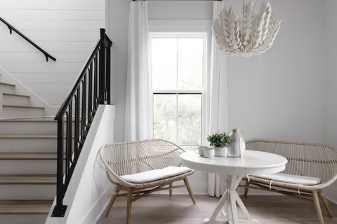 a view of a livingroom with furniture and window