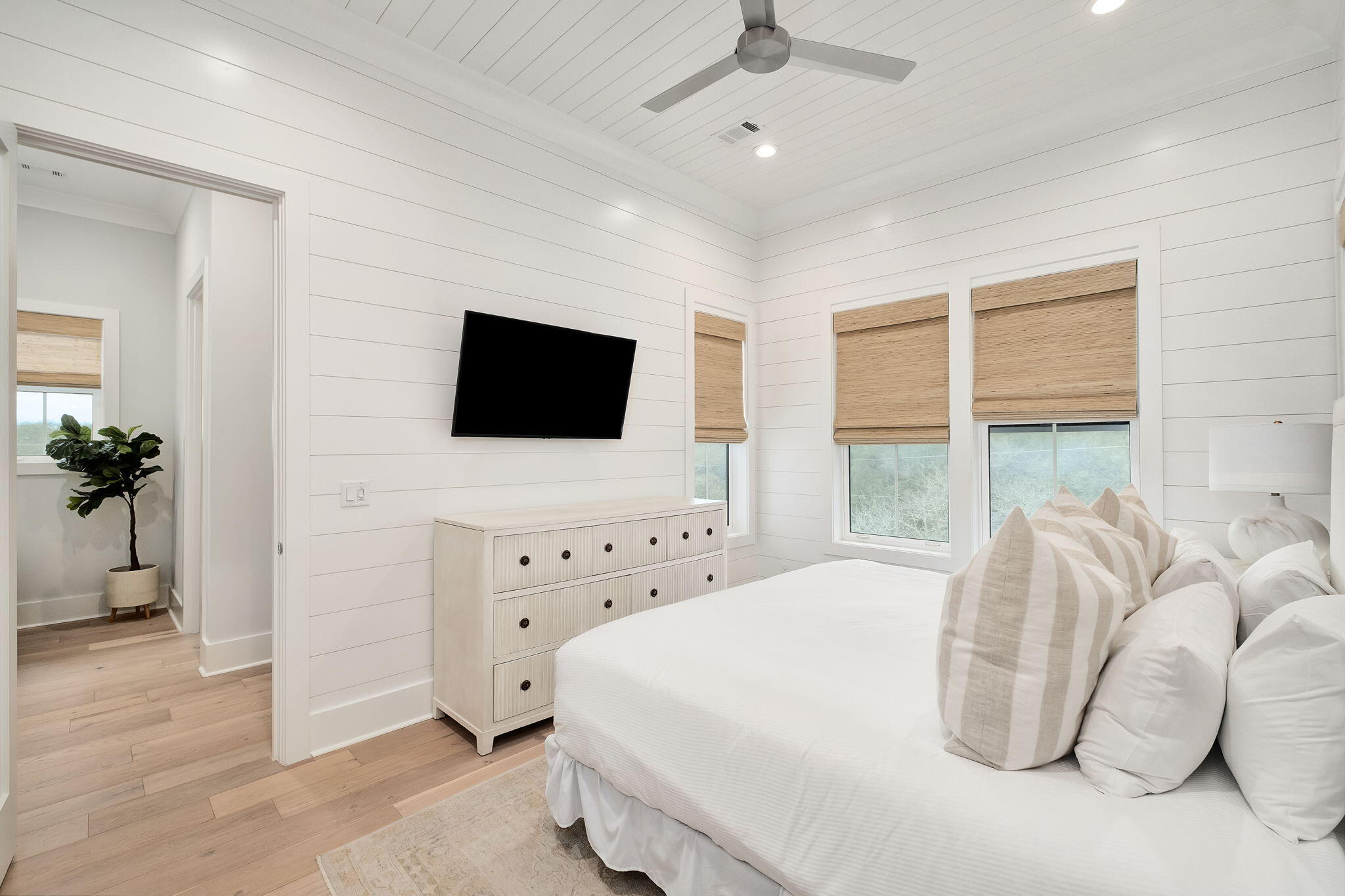 133 Bullard Road Santa Rosa Beach, FL 32459 - Photo 10 of 19 a bedroom with a bed and flat screen tv