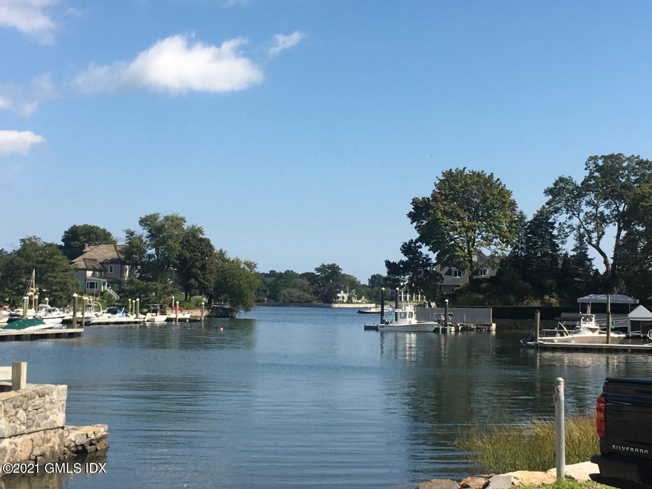 68 Byram Road, Unit 2 Greenwich, CT 06830 - Photo 18 of 20 a view of river covered by trees and buildings