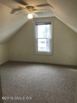68 Byram Road, Unit 2 Greenwich, CT 06830 - Photo 9 of 20 an empty room with a window